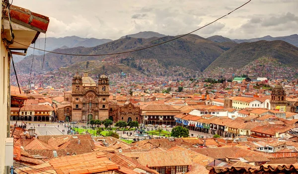 CUSCO, PERU - APRIL 2018: Rooftops of the historical center in cloudy weather
