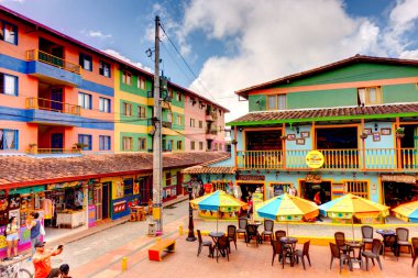 Guatape, Antioquia, Colombia - May 2019 : Colorful village in cloudy weather