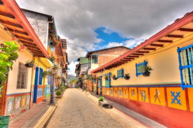Guatape, Antioquia, Colombia - May 2019 : Colorful village in cloudy weather
