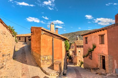ALBARRACIN, SPAIN - JUNE 2019: Historical center in sunny weather, HDR image