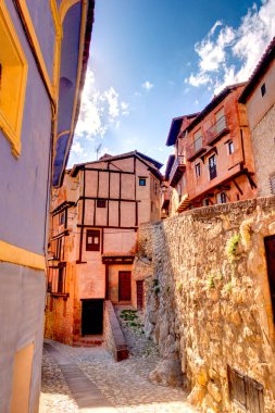 ALBARRACIN, SPAIN - JUNE 2019: Historical center in sunny weather, HDR image