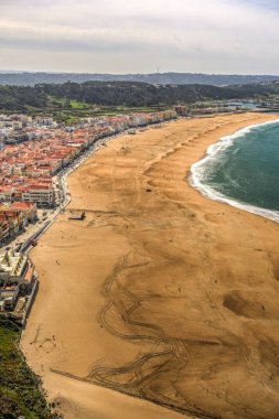 NAZARE, PORTUGAL - APRIL 2018 : Seaside resort Nazare in sunny weather