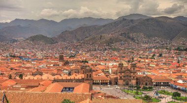CUSCO, PERU - APRIL 2018: Rooftops of the historical center in cloudy weather