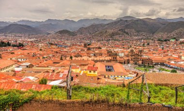 CUSCO, PERU - APRIL 2018: Rooftops of the historical center in cloudy weather