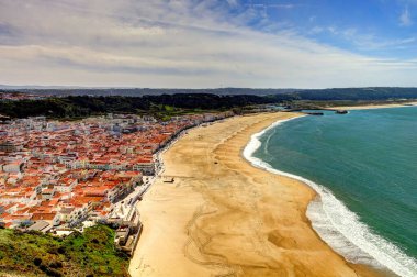 NAZARE, PORTUGAL - APRIL 2018 : Seaside resort Nazare in sunny weather