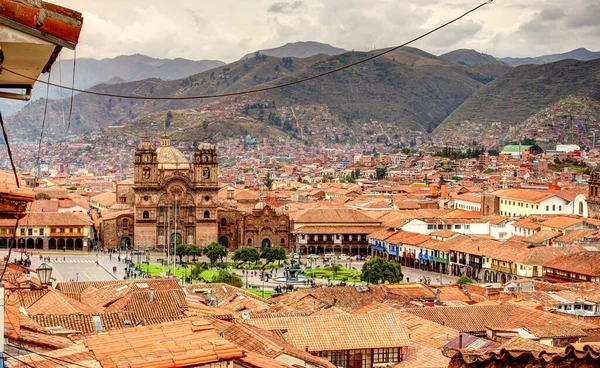 CUSCO, PERU - APRIL 2018: Rooftops of the historical center in cloudy weather