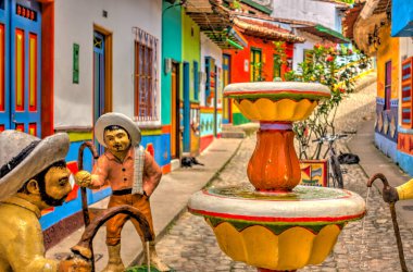 Guatape, Antioquia, Colombia - May 2019 : Colorful village in cloudy weather