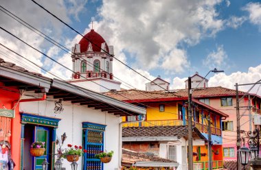 Guatape, Antioquia, Colombia - May 2019 : Colorful village in cloudy weather