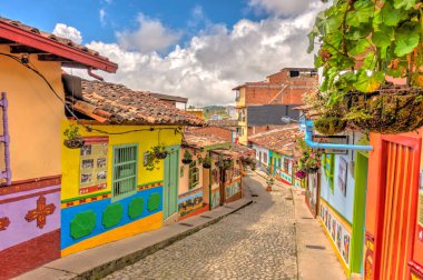 Guatape, Antioquia, Colombia - May 2019 : Colorful village in cloudy weather