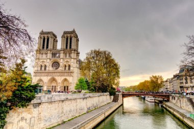 Paris, France - April 2019 : Notre Dame cathedral in cloudy weather
