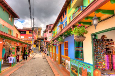 Guatape, Antioquia, Colombia - May 2019 : Colorful village in cloudy weather