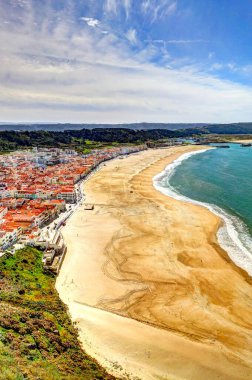 NAZARE, PORTUGAL - APRIL 2018 : Seaside resort Nazare in sunny weather