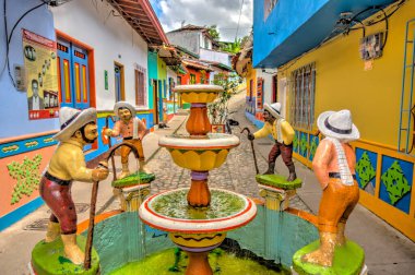 Guatape, Antioquia, Colombia - May 2019 : Colorful village in cloudy weather