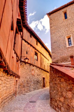 ALBARRACIN, SPAIN - JUNE 2019: Historical center in sunny weather, HDR image