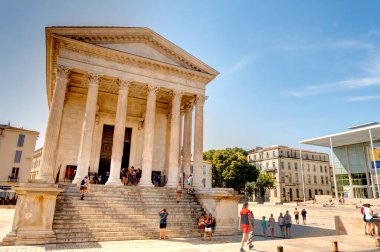 NIMES, FRANCE - AUGUST 2019: Historical landmarks in summertime, HDR image