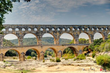 NIMES, FRANCE - AUGUST 2019: Historical landmarks in summertime, HDR image