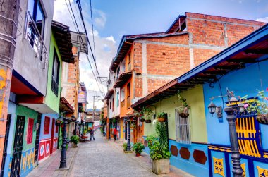 Guatape, Antioquia, Colombia - May 2019 : Colorful village in cloudy weather