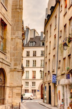 Paris, France - May 2019 : Marais district in cloudy weather