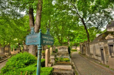 Paris, France - May 2019 : Pere Lachaise Cemetery in cloudy weather