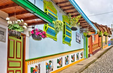 Guatape, Antioquia, Colombia - May 2019 : Colorful village in cloudy weather