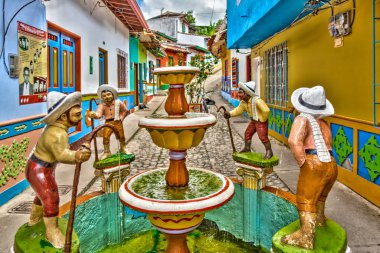 Guatape, Antioquia, Colombia - May 2019 : Colorful village in cloudy weather