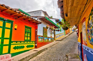 Guatape, Antioquia, Colombia - May 2019 : Colorful village in cloudy weather