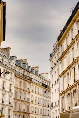 Paris, France - May 2019 : Marais district in cloudy weather