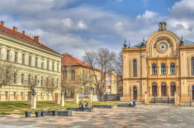 Pecs, Hungary - March 2017: Historical center in cloudy weather, HDR                  