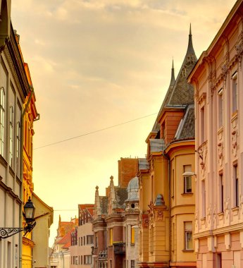 Pecs, Hungary - March 2017: Historical center in cloudy weather, HDR                  