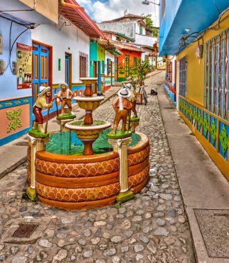 Guatape, Antioquia, Colombia - May 2019 : Colorful village in cloudy weather
