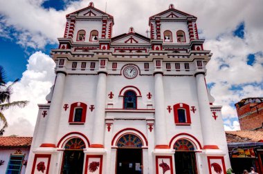 Guatape, Antioquia, Colombia - May 2019 : Colorful village in cloudy weather