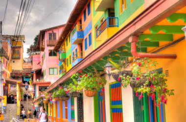 Guatape, Antioquia, Colombia - May 2019 : Colorful village in cloudy weather