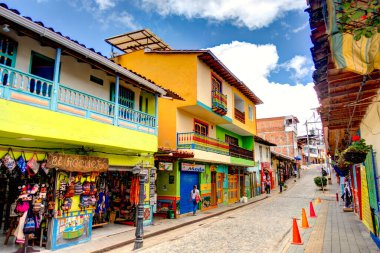 Guatape, Antioquia, Colombia - May 2019 : Colorful village in cloudy weather