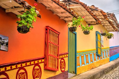 Guatape, Antioquia, Colombia - May 2019 : Colorful village in cloudy weather