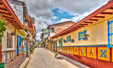 Guatape, Antioquia, Colombia - May 2019 : Colorful village in cloudy weather