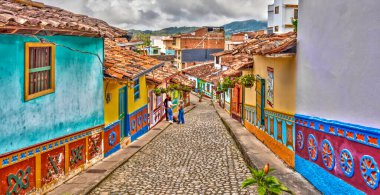 Guatape, Antioquia, Colombia - May 2019 : Colorful village in cloudy weather