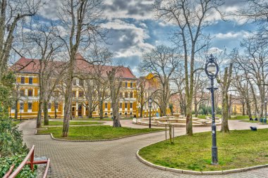 Pecs, Hungary - March 2017: Historical center in cloudy weather, HDR                  
