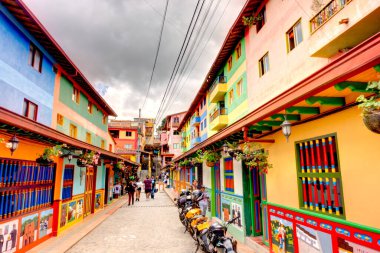 Guatape, Antioquia, Colombia - May 2019 : Colorful village in cloudy weather