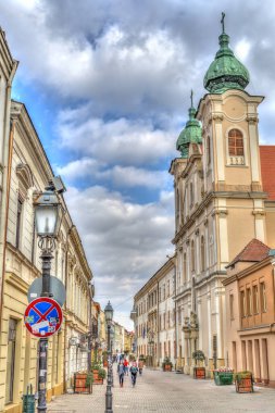 Pecs, Hungary - March 2017: Historical center in cloudy weather, HDR                  