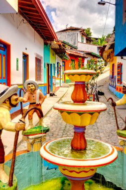 Guatape, Antioquia, Colombia - May 2019 : Colorful village in cloudy weather