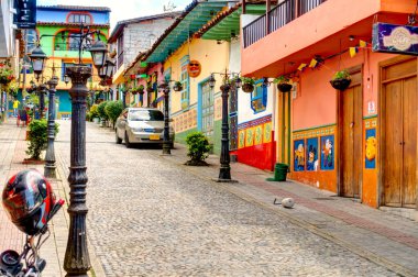 Guatape, Antioquia, Colombia - May 2019 : Colorful village in cloudy weather