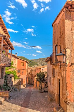 ALBARRACIN, SPAIN - JUNE 2019: Historical center in sunny weather, HDR image
