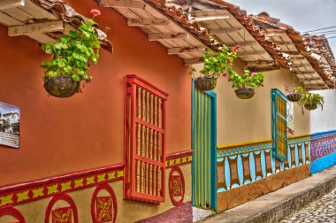 Guatape, Antioquia, Colombia - May 2019 : Colorful village in cloudy weather