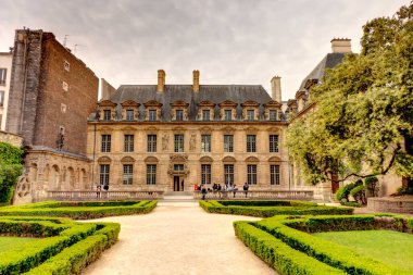 Paris, France - May 2019 : Marais district in cloudy weather