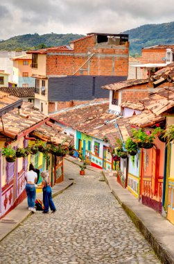 Guatape, Antioquia, Colombia - May 2019 : Colorful village in cloudy weather