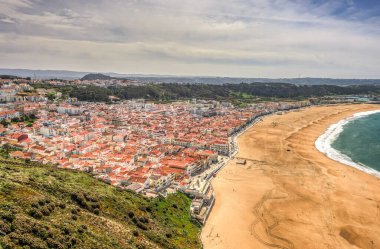 NAZARE, PORTUGAL - APRIL 2018 : Seaside resort Nazare in sunny weather