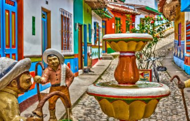 Guatape, Antioquia, Colombia - May 2019 : Colorful village in cloudy weather