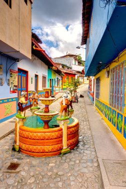 Guatape, Antioquia, Colombia - May 2019 : Colorful village in cloudy weather