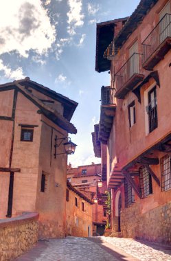 ALBARRACIN, SPAIN - JUNE 2019: Historical center in sunny weather, HDR image
