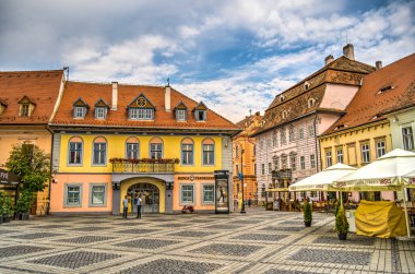 SIBIU, ROMANIA - AUGUST 2022: Historical center in cloudy weather, HDR Image